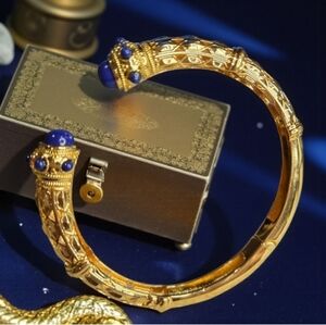 Cuff bangle gold tone with Blue Stone Accents